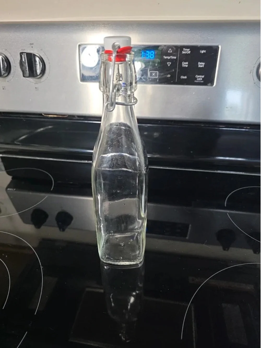 Clear Glass Bottle with Swing-Top Cap